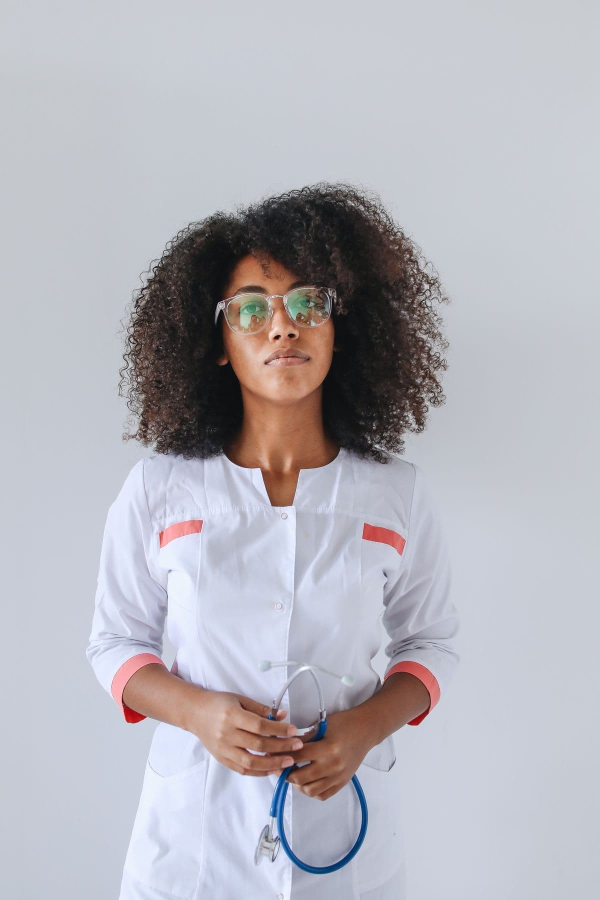 A warm, professional portrait of a diverse female healthcare worker